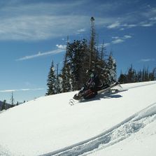 Snowmobiling in fresh snow